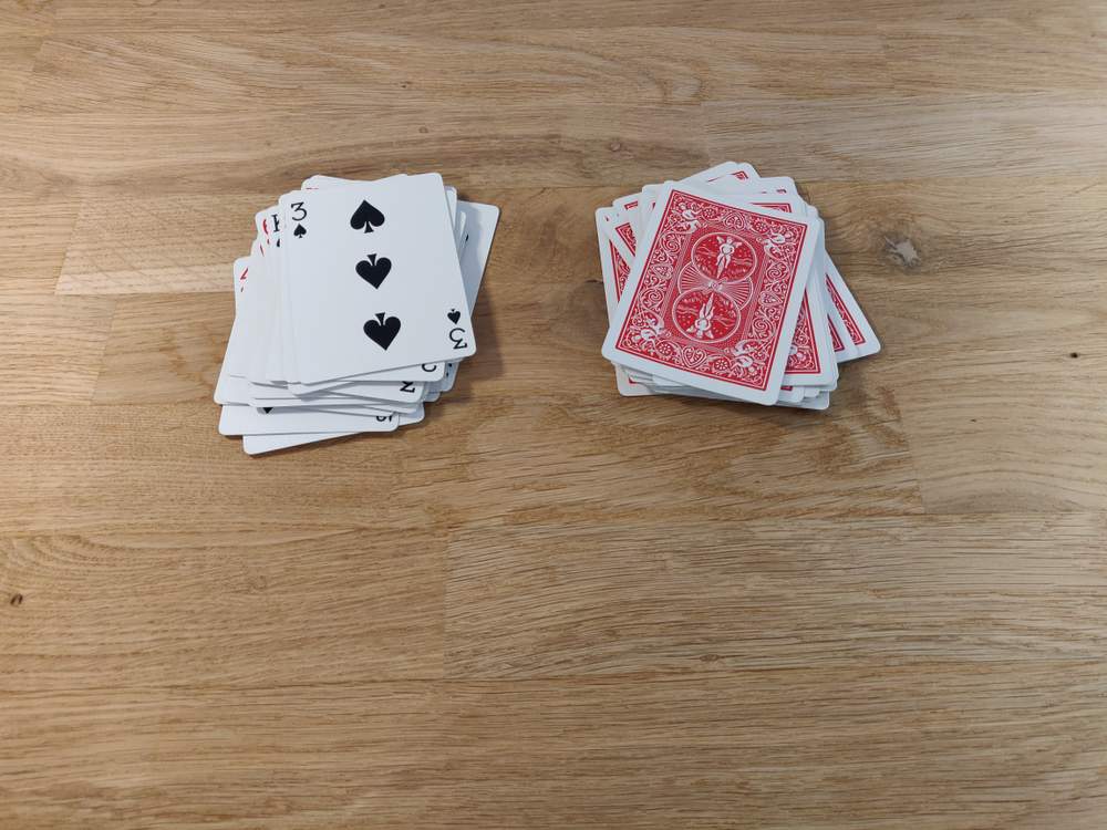 Dealing the cards onto the table 4